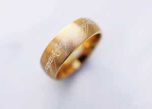 Open image in slideshow, everaftercreative Ring Elvish Script Gold Brushed Tungsten Wedding Band, Fantasy Wedding Ring, Calligraphy Wedding Ring.
